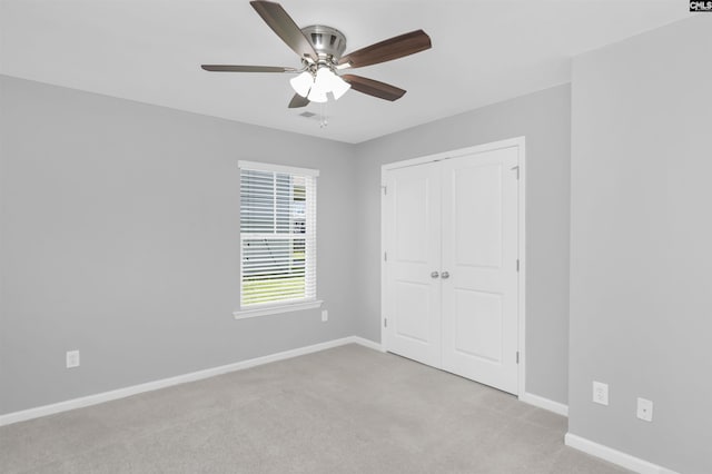 821 Burnview Ln, Chapin, SC 29036 - unfurnished bedroom with carpet floors, a closet, and a ceiling fan