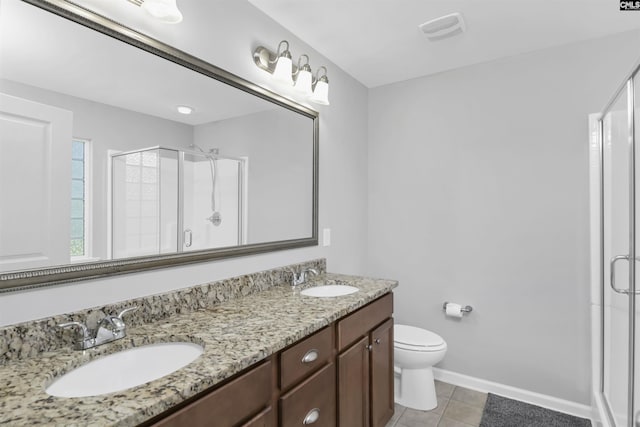 821 Burnview Ln, Chapin, SC 29036 - full bathroom featuring a shower stall, double vanity, and tile patterned floors