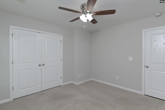 821 Burnview Ln, Chapin, SC 29036 - unfurnished bedroom featuring light carpet, a closet, and a ceiling fan