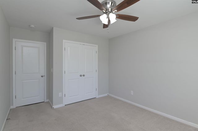 821 Burnview Ln, Chapin, SC 29036 - unfurnished bedroom featuring light carpet, a closet, and ceiling fan