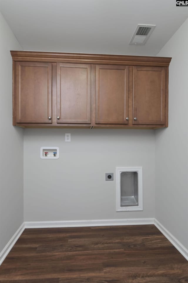 821 Burnview Ln, Chapin, SC 29036 - washroom featuring hookup for a washing machine, hookup for an electric dryer, dark wood-type flooring, and cabinet space
