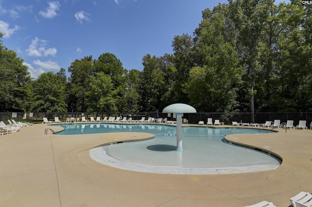821 Burnview Ln, Chapin, SC 29036 - community pool with a patio area and view of scattered trees