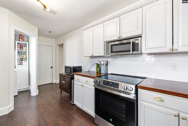 103 Faircrest Way, Columbia, SC 29229 - kitchen with appliances with stainless steel finishes, butcher block countertops, tasteful backsplash, dark wood-style floors, and white cabinets