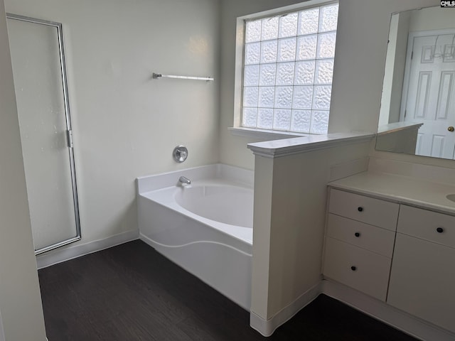 103 Faircrest Way, Columbia, SC 29229 - full bathroom with a garden tub, vanity, and wood finished floors