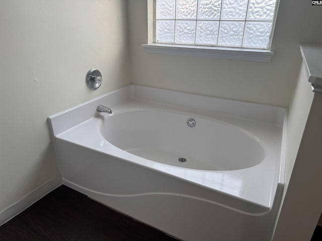 103 Faircrest Way, Columbia, SC 29229 - bathroom with a garden tub and wood finished floors