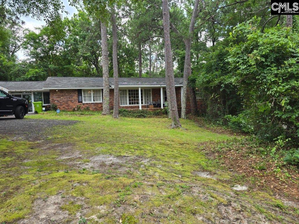 23 Coronet Dr, Columbia, SC 29206 - ranch-style house with brick siding and a front lawn