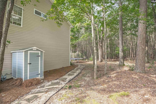 269 Creek Branch Dr, Lexington, SC 29072 - view of yard with a trampoline and a shed