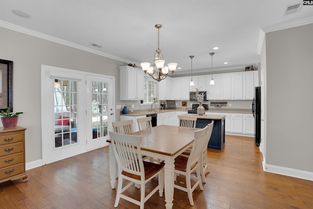 269 Creek Branch Dr, Lexington, SC 29072 - dining area featuring ornamental molding, a chandelier, hardwood / wood-style flooring, and recessed lighting