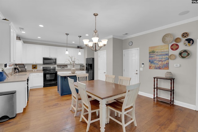 269 Creek Branch Dr, Lexington, SC 29072 - dining space with a chandelier, crown molding, light wood-type flooring, and recessed lighting