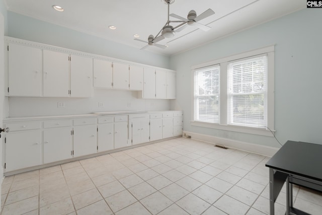 232 Boulware Rd, Lugoff, SC 29078 - kitchen featuring ceiling fan, light countertops, white cabinetry, recessed lighting, and crown molding