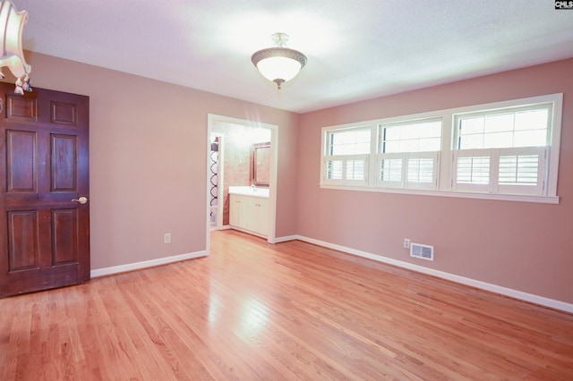 2115 Ohara Ct, Columbia, SC 29204 - spare room featuring light wood-style flooring and baseboards