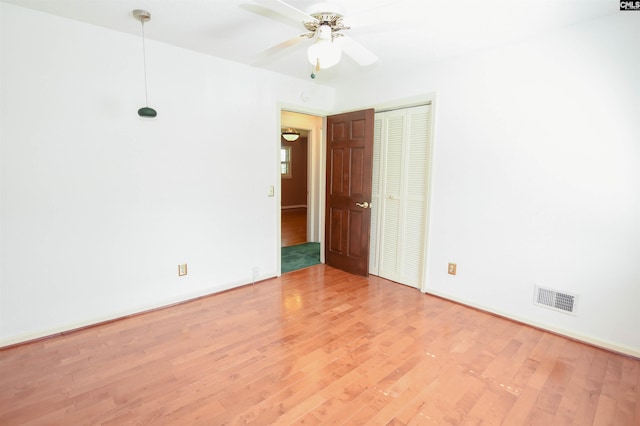 2115 Ohara Ct, Columbia, SC 29204 - spare room with wood finished floors and a ceiling fan