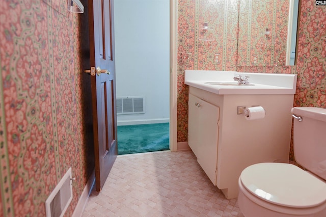 2115 Ohara Ct, Columbia, SC 29204 - half bath featuring wallpapered walls and vanity