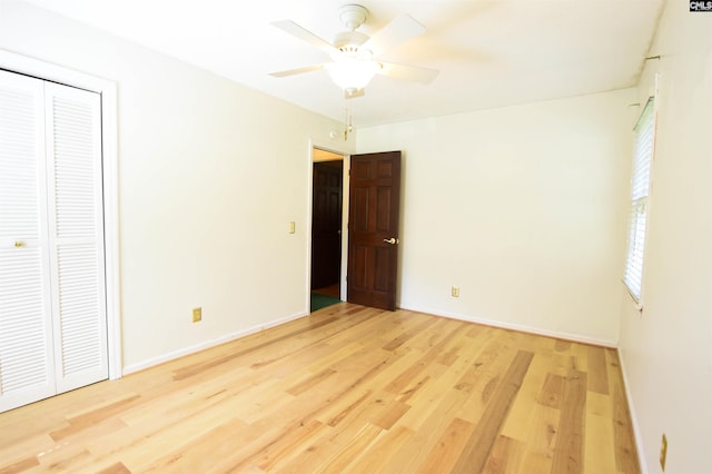 2115 Ohara Ct, Columbia, SC 29204 - unfurnished bedroom with light wood-style floors, a closet, and ceiling fan
