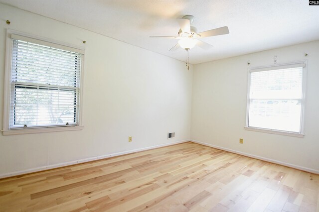 2115 Ohara Ct, Columbia, SC 29204 - spare room featuring healthy amount of natural light, light wood-style floors, and ceiling fan