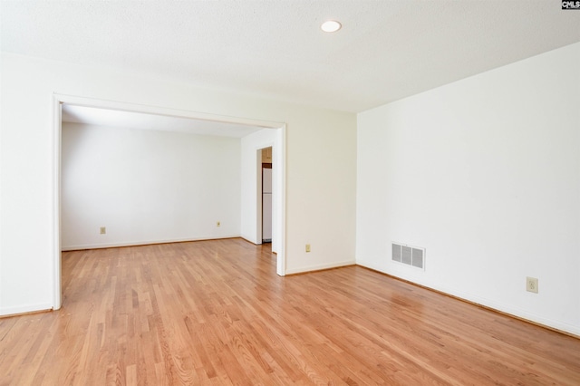 2115 Ohara Ct, Columbia, SC 29204 - empty room featuring light wood-type flooring and recessed lighting
