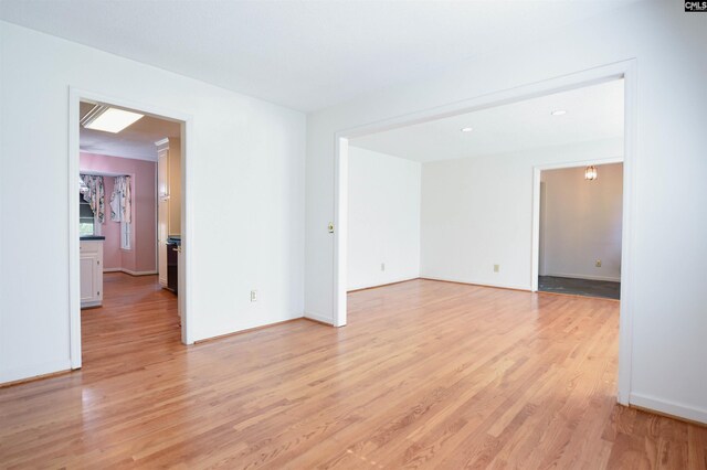 2115 Ohara Ct, Columbia, SC 29204 - spare room with light wood-type flooring and baseboards
