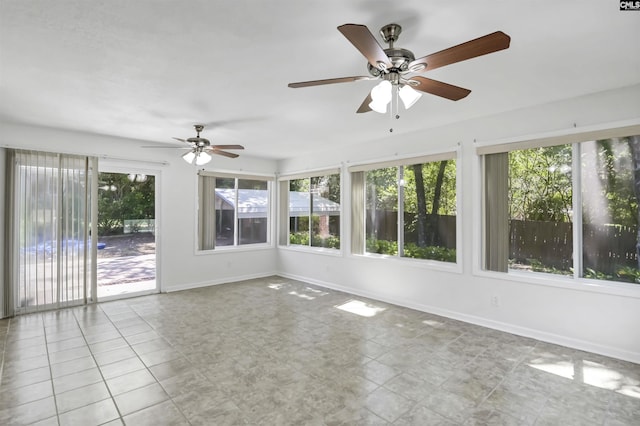 136 Traylors Gate Cir, Irmo, SC 29063 - unfurnished sunroom with baseboards and tile patterned floors