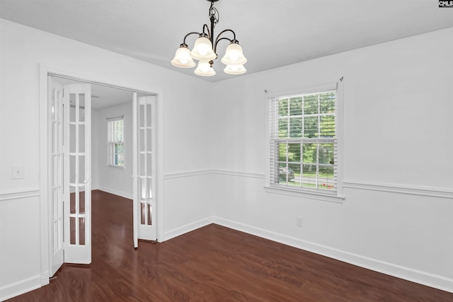 136 Traylors Gate Cir, Irmo, SC 29063 - empty room with wood finished floors and a chandelier
