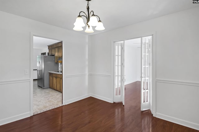 136 Traylors Gate Cir, Irmo, SC 29063 - unfurnished dining area with a chandelier and wood finished floors