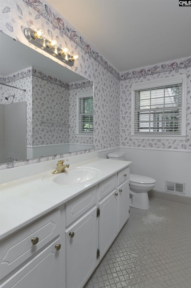 136 Traylors Gate Cir, Irmo, SC 29063 - full bath with wallpapered walls, vanity, a shower, healthy amount of natural light, and a wainscoted wall