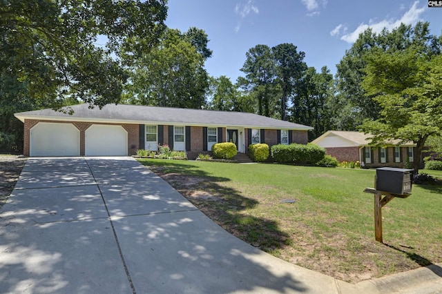 136 Traylors Gate Cir, Irmo, SC 29063 - single story home with driveway, brick siding, a garage, and a front yard