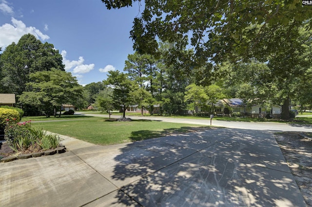 136 Traylors Gate Cir, Irmo, SC 29063 - view of property's community featuring a yard and view of wooded area