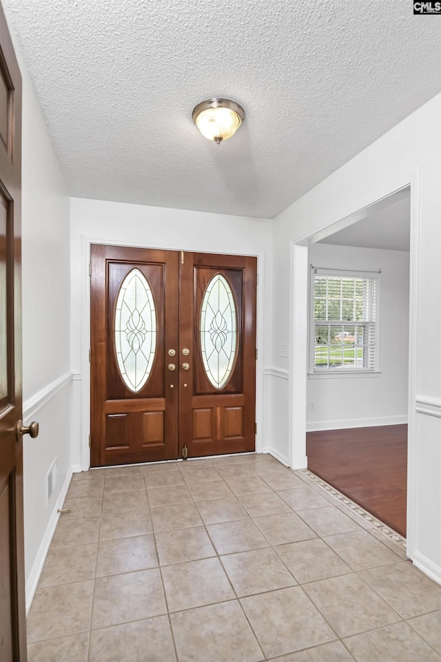 136 Traylors Gate Cir, Irmo, SC 29063 - entrance foyer with light tile patterned flooring and a textured ceiling