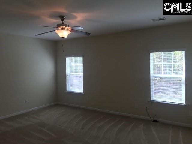 532 Slices Way, Chapin, SC 29036 - carpeted empty room featuring baseboards and a ceiling fan