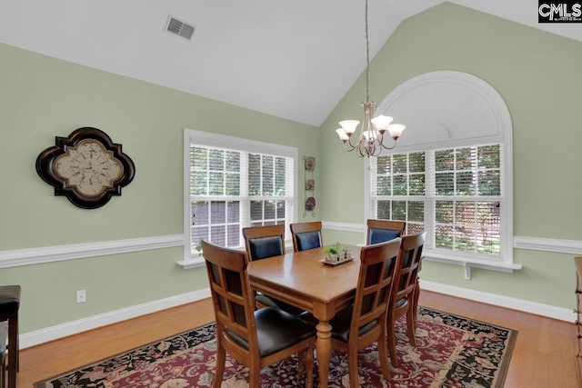 430 Plantation Pointe Dr, Elgin, SC 29045 - dining space featuring a chandelier, wood finished floors, and lofted ceiling