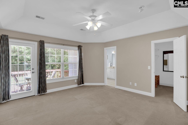 430 Plantation Pointe Dr, Elgin, SC 29045 - unfurnished bedroom featuring light carpet, access to outside, a raised ceiling, and ensuite bath