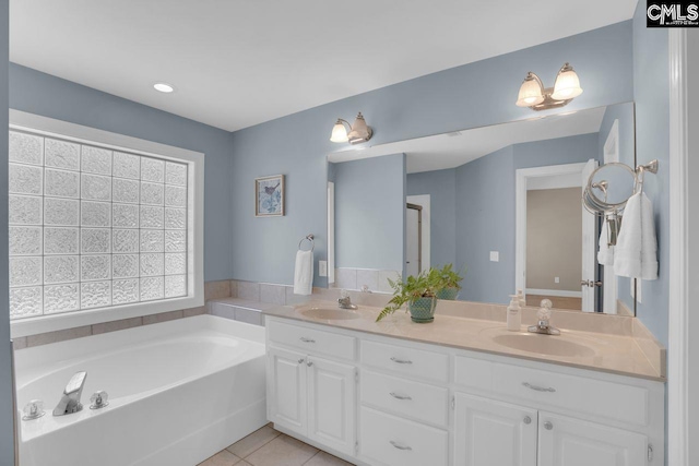 430 Plantation Pointe Dr, Elgin, SC 29045 - full bathroom featuring double vanity, a bath, and tile patterned floors