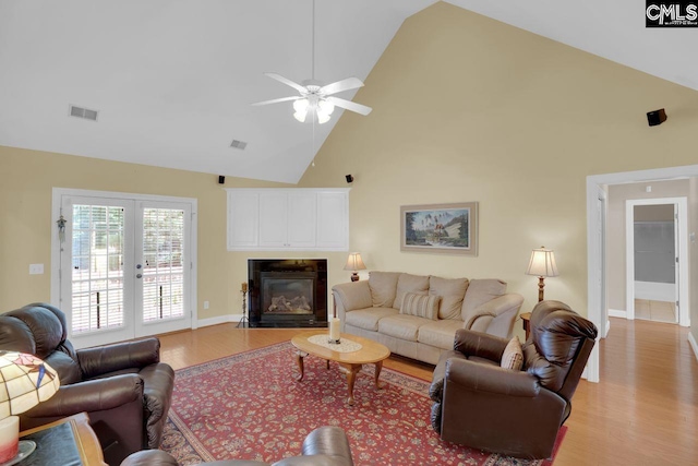 430 Plantation Pointe Dr, Elgin, SC 29045 - living area featuring high vaulted ceiling, light wood-style floors, french doors, a fireplace with flush hearth, and ceiling fan