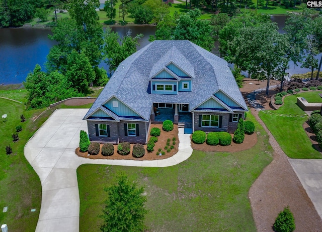 605 Flycatcher Ln, Blythewood, SC 29016 - view of front of home with concrete driveway, a water view, board and batten siding, roof with shingles, and brick siding