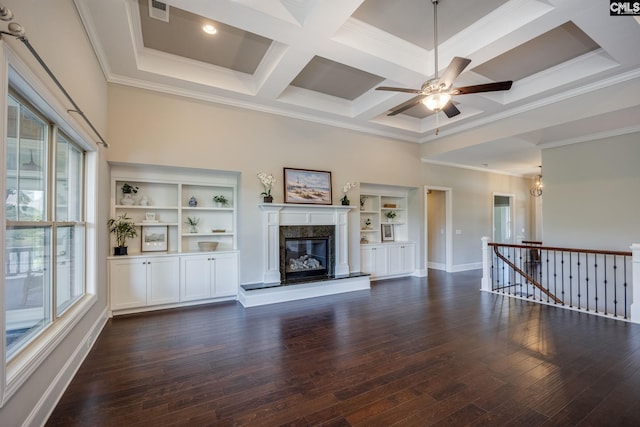 605 Flycatcher Ln, Blythewood, SC 29016 - unfurnished living room with crown molding, dark wood-style floors, ceiling fan, a premium fireplace, and coffered ceiling