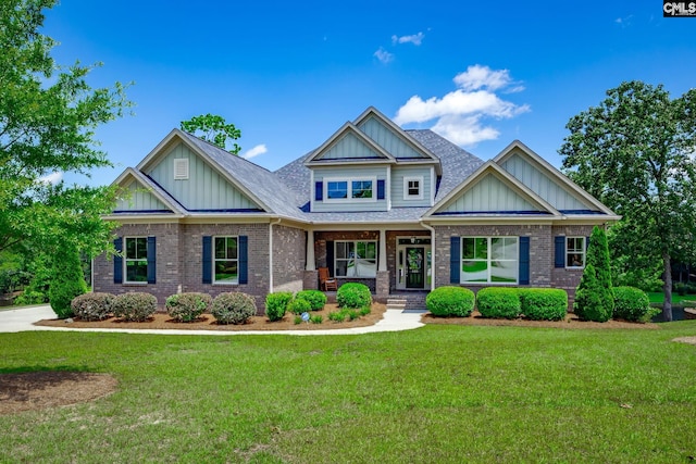 605 Flycatcher Ln, Blythewood, SC 29016 - craftsman inspired home featuring board and batten siding, a front lawn, and brick siding