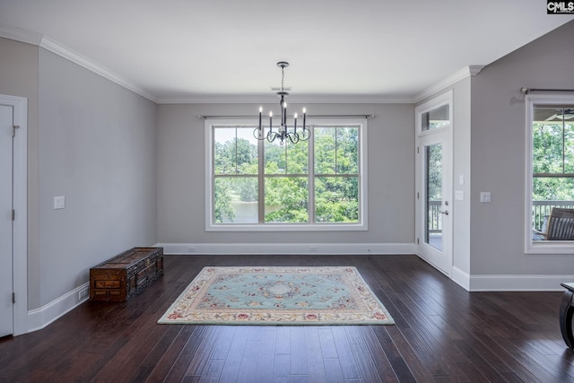 605 Flycatcher Ln, Blythewood, SC 29016 - unfurnished dining area featuring a chandelier, hardwood / wood-style floors, and ornamental molding