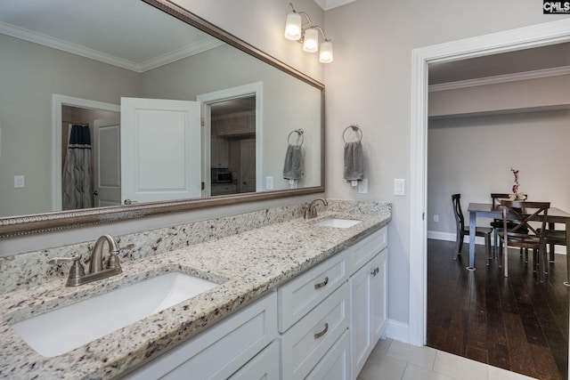 605 Flycatcher Ln, Blythewood, SC 29016 - full bath with double vanity, crown molding, and wood finished floors