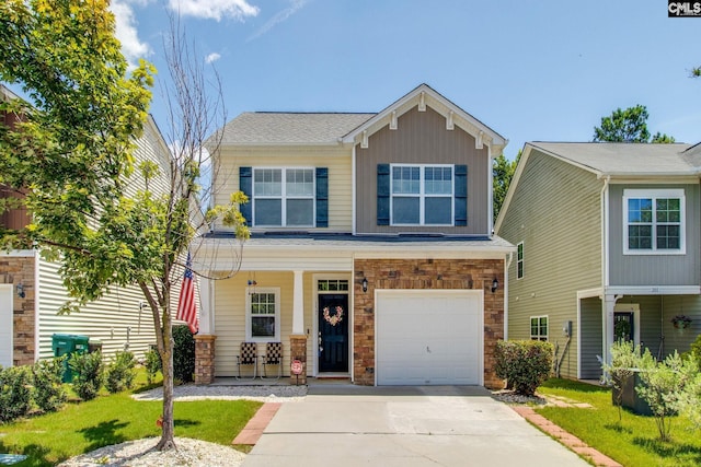 157 Autumn Stroll Ct, Lexington, SC 29072 - craftsman-style home with a porch, driveway, stone siding, an attached garage, and a front yard