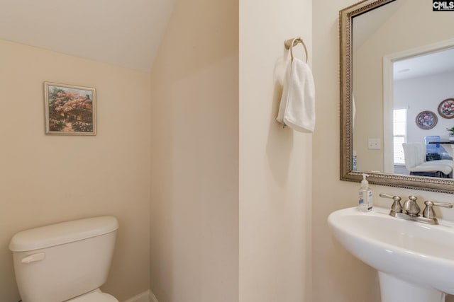 157 Autumn Stroll Ct, Lexington, SC 29072 - half bathroom featuring a sink and lofted ceiling