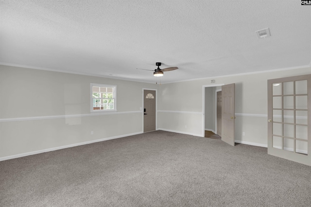 898 Perry Blvd, Sumter, SC 29154 - empty room with a textured ceiling, ceiling fan, carpet flooring, and crown molding