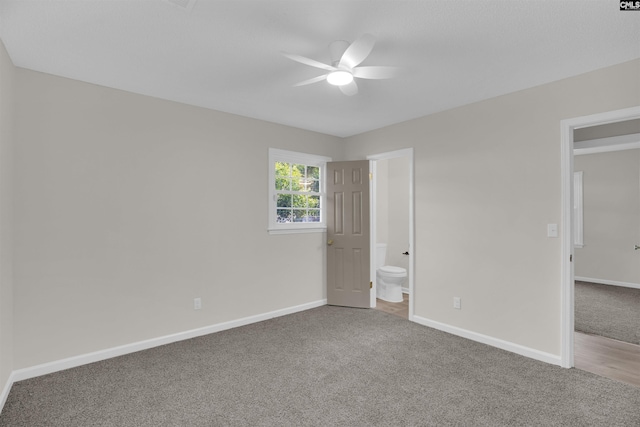 898 Perry Blvd, Sumter, SC 29154 - unfurnished bedroom featuring carpet, ensuite bathroom, and ceiling fan