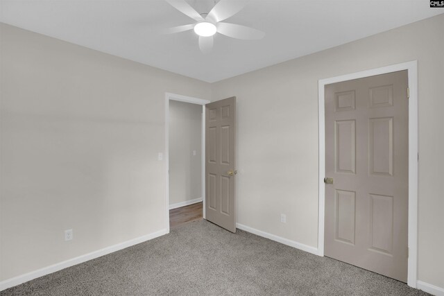 898 Perry Blvd, Sumter, SC 29154 - unfurnished bedroom with carpet floors and a ceiling fan