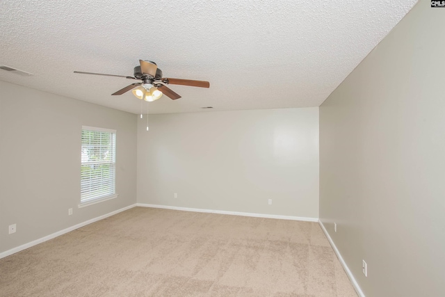 141 Wigmore Ln, Lexington, SC 29072 - empty room featuring a ceiling fan, light colored carpet, and a textured ceiling