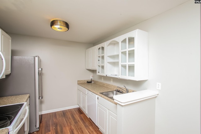 141 Wigmore Ln, Lexington, SC 29072 - kitchen with white appliances, glass insert cabinets, dark wood-style floors, and white cabinets