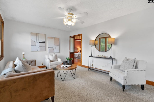 623 Hook Ave, West Columbia, SC 29169 - living room with ceiling fan, carpet, and a textured ceiling