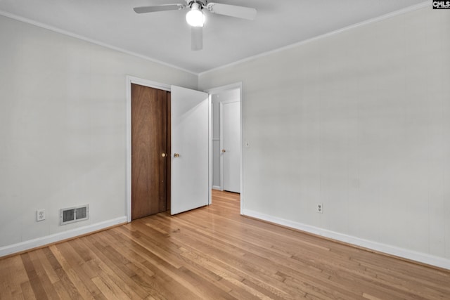 2017 Wellington Rd, Cayce, SC 29033 - empty room featuring wood finished floors, a ceiling fan, and crown molding