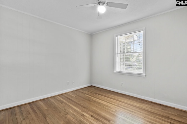 2017 Wellington Rd, Cayce, SC 29033 - empty room featuring hardwood / wood-style floors, crown molding, and a ceiling fan