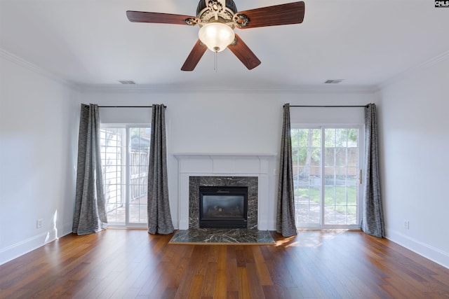 400 Mallet Hill Rd Unit B1, Columbia, SC 29223 - unfurnished living room with plenty of natural light, a fireplace, wood finished floors, a ceiling fan, and ornamental molding