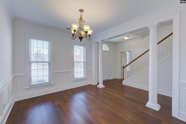 400 Mallet Hill Rd Unit B1, Columbia, SC 29223 - foyer entrance featuring decorative columns, a chandelier, dark wood-style floors, stairs, and crown molding
